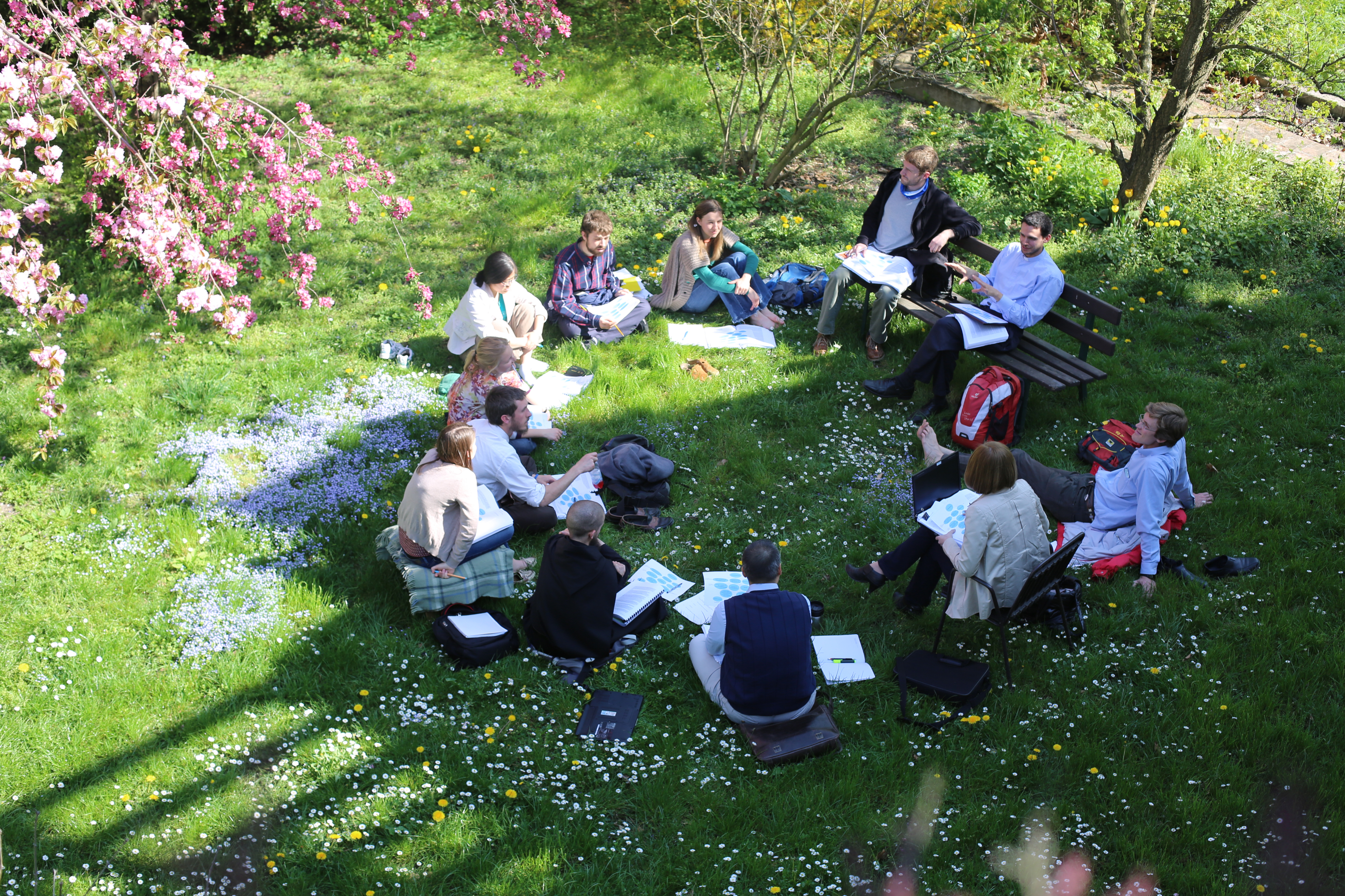 Students gathered outdoors on the campus lawn